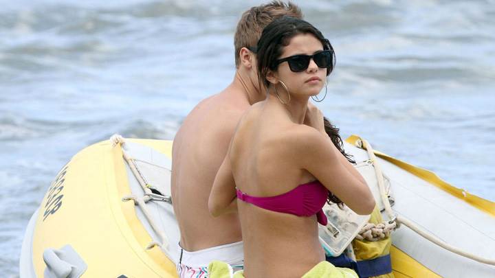 Selena Gomez Sitting In Boat In Pink Bikini N Black Goggles